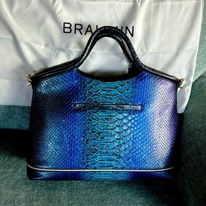 Selling because I discovered this satchel is just larger than I need.